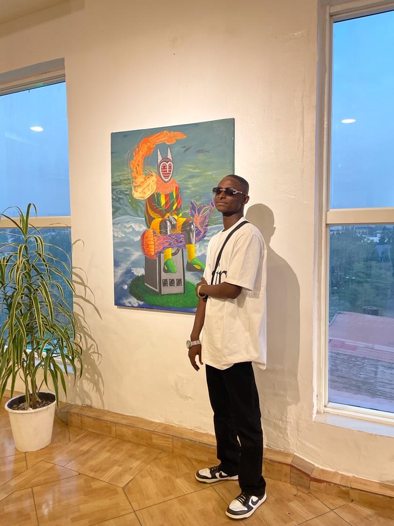 Roland and his acrylic painting "The Dance of Resilence"
